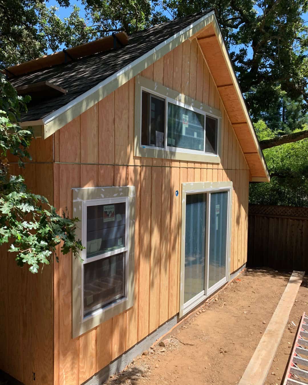 Exterior wood siding and new window installation for a residential ADU construction project in San Carlos, CA.
