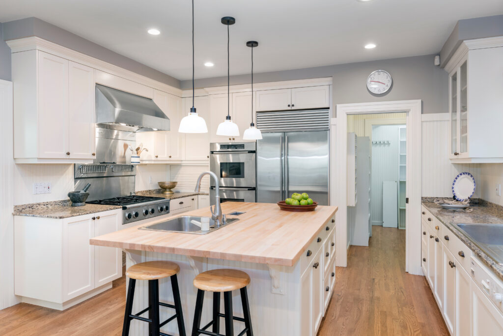 Kitchen remodel timeline San Mateo County — mid-range kitchen renovation with new cabinetry and countertops by Genuine Kitchen and Bath in San Carlos